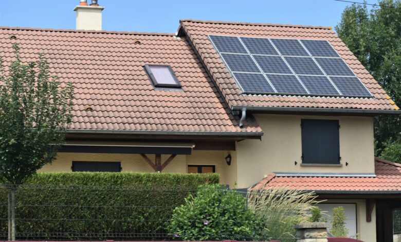 a house with a solar panel on the roof